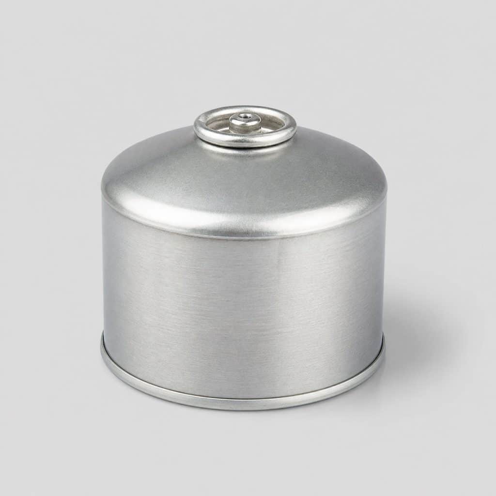 Petite cartouche de gaz à vis de 100 g sur fond clair
